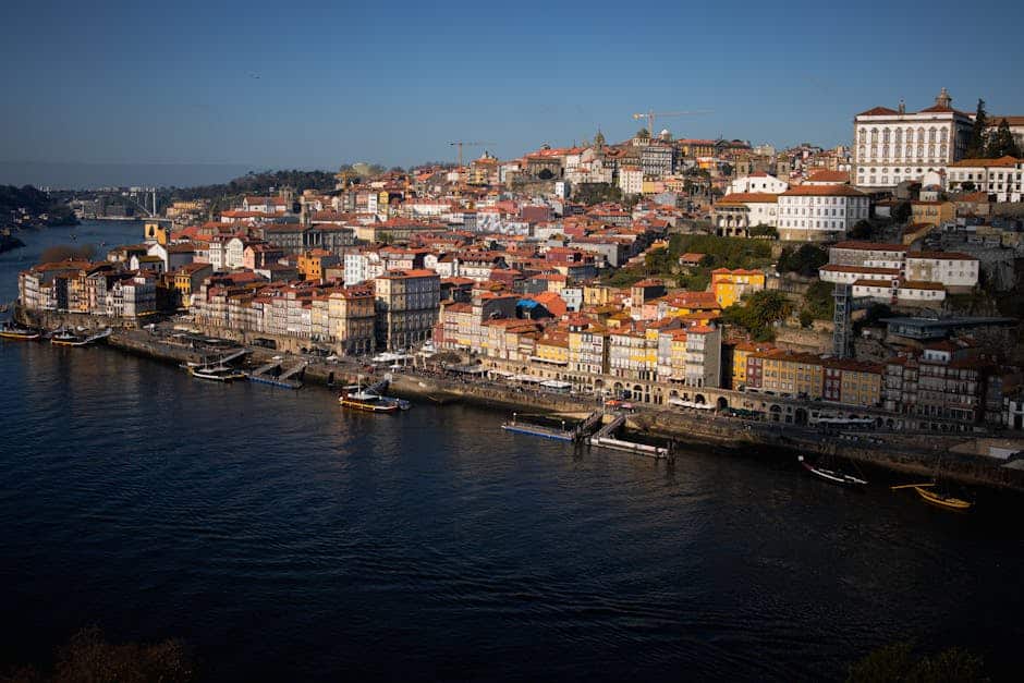 Stunning aerial view of Porto with colorful architecture along the Douro River.