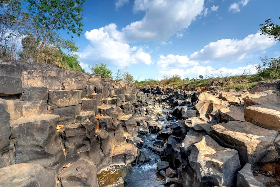 Flowing water through unique rock formations in Gia Lai Province, Vietnam.