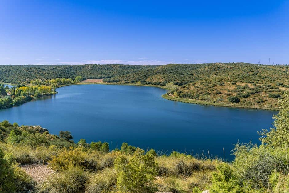 Breathtaking view of the serene Lagunas de Ruidera in Castilla-La Mancha, Spain.